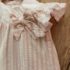 Jesusito con capota bebé niña con estampado a rayas rosa de cocote